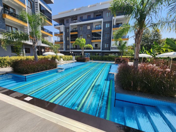 Prostrani 2+1 stan s bazenom, teretanom i društvenim sadržajima u modernoj rezidenciji