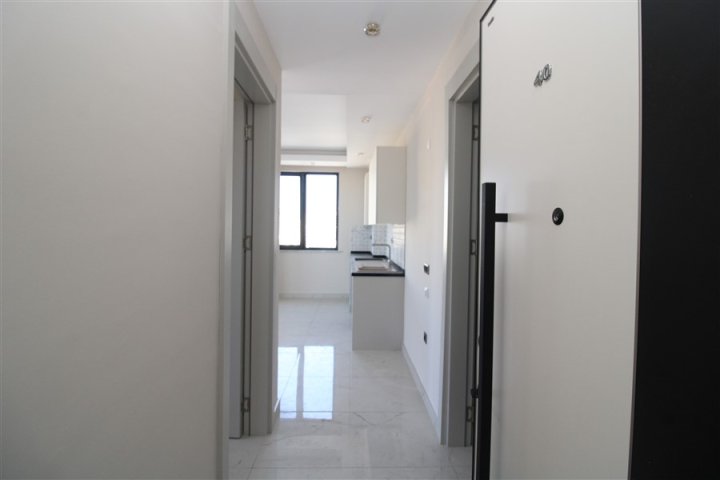 Moderan 1+1 stan za prodaju u Mahmutlaru, 200m udaljen od mora