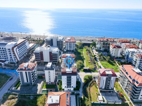 Modern 4+1 Apartment for Sale Near the Sea in Kestel, Zodiac Taurus