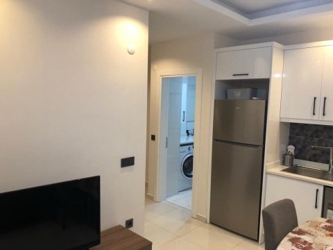 Moderne möblierte 1+1 Wohnung zum Verkauf in Kargicak Sofia Park