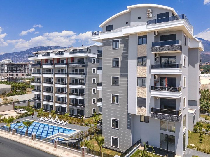 Achetez un appartement de 2 chambres à Alanya Kargicak, meublé, près de la mer et de la piscine