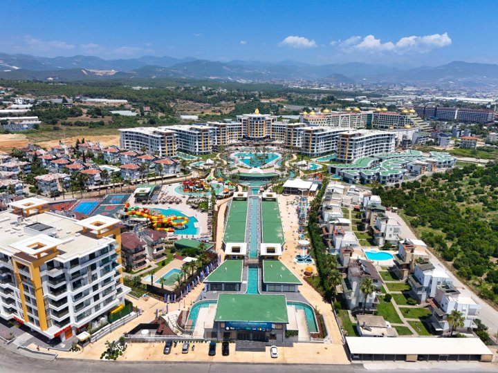 Apartment for Sale in Turkler Alanya: 1-5 Bedrooms with Sea View and Citizenship Opportunity