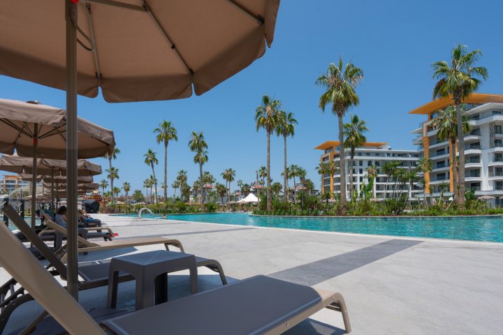 Apartment for Sale in Turkler Alanya: 1-5 Bedrooms with Sea View and Citizenship Opportunity