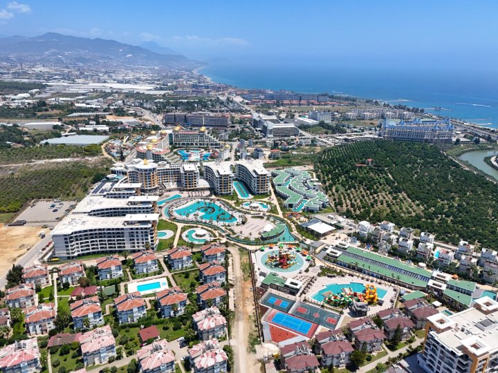 Apartment for Sale in Turkler Alanya: 1-5 Bedrooms with Sea View and Citizenship Opportunity