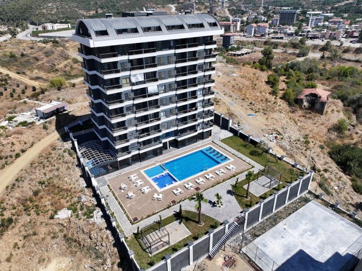 Alanya Demirtaş'ta Doğa Manzaralı Satılık 1+1 Daire