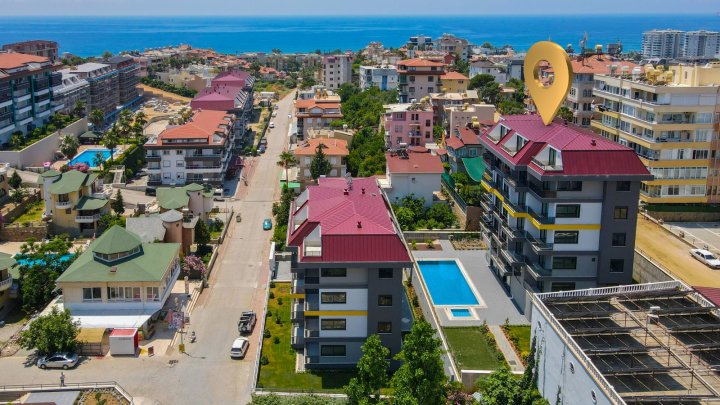 Przystępne cenowo apartamenty z widokiem na morze na sprzedaż w Alanji | Nowa inwestycja nieruchomości w Turcji