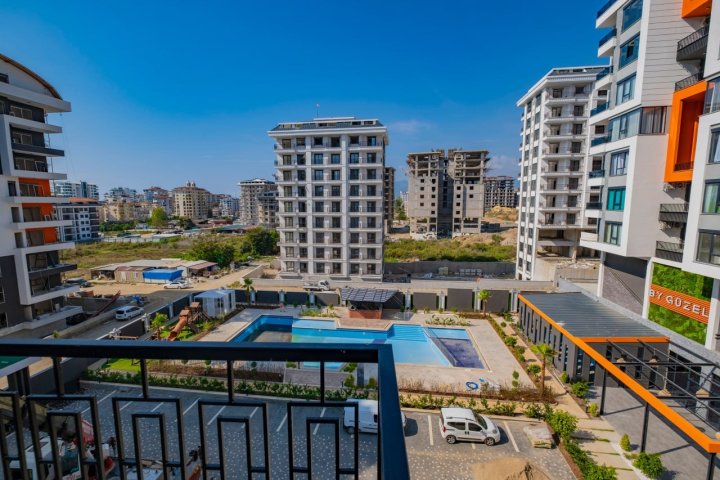 Apartament z 1 sypialnią na sprzedaż z basenem, blisko morza w Mahmutlar, Alanya