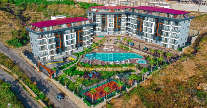 Inwestuj w apartamenty Alanya Kestel, 1-4 sypialnie, basen i plaża w pobliżu