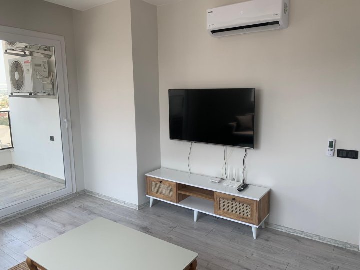 مرسين أردمي توموك: شقة بغرفتي نوم مع مسبح وإطلالة على البحر للبيع