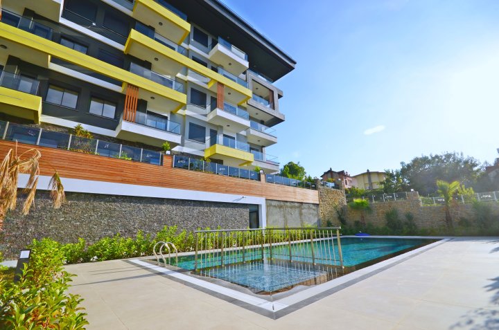 Inwestuj w apartamenty 1, 2, 4-pokojowe z basenem niedaleko plaży w Kestel, Alanya