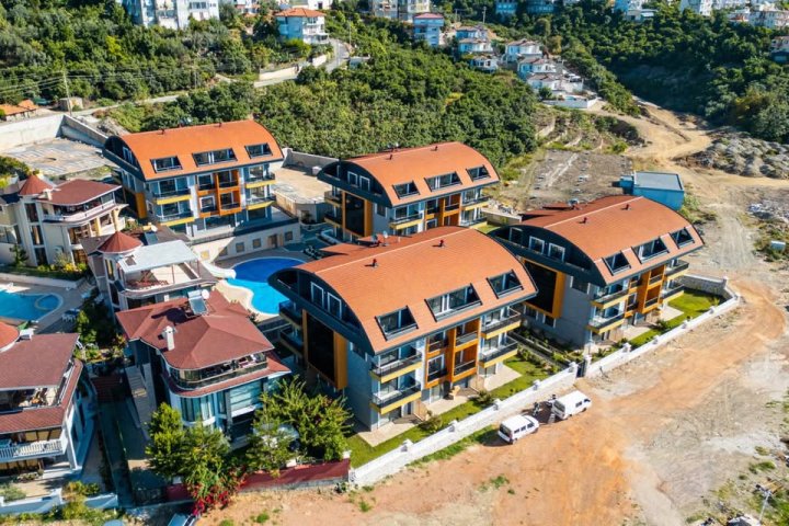 Appartements éligibles à la citoyenneté à Hasbahce, Alanya à vendre avec accès à la piscine