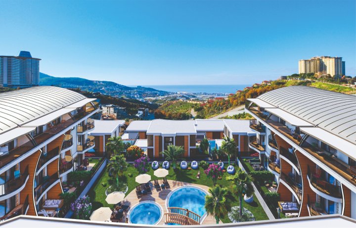 Invest in Alanya Kargicak's 1-4-8 Bedroom Apartments with Sea View and Citizenship